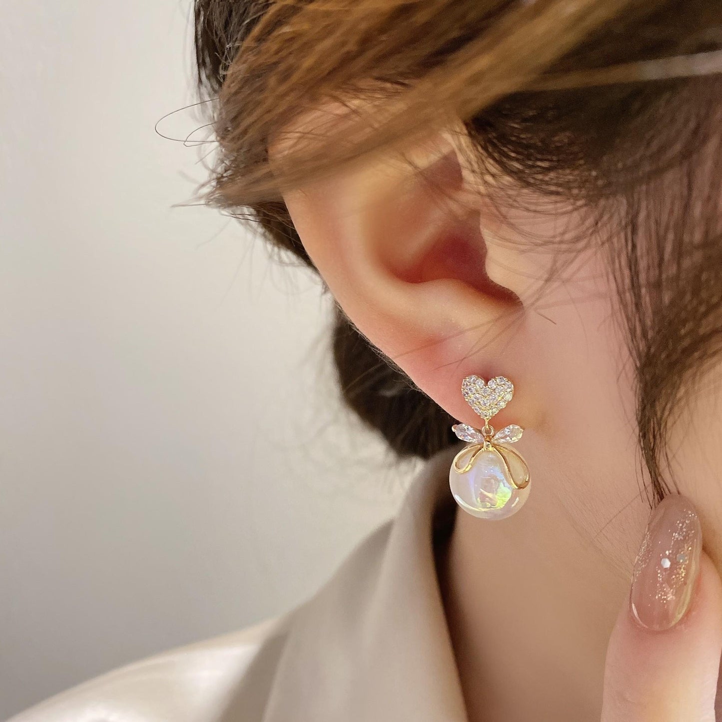 Korean Minimalist Pearl Bow Studs – Hypoallergenic Elegance for Women