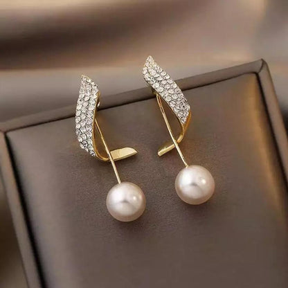 Korean Pearl Wing Stud Earrings – Grace in Every Detail
