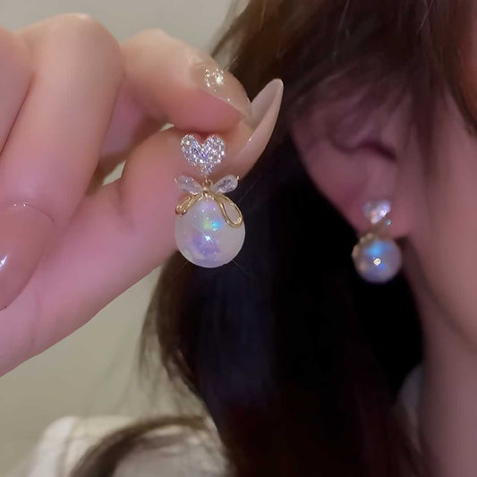 Korean Minimalist Pearl Bow Studs – Hypoallergenic Elegance for Women
