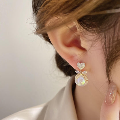 Korean Minimalist Pearl Bow Studs – Hypoallergenic Elegance for Women